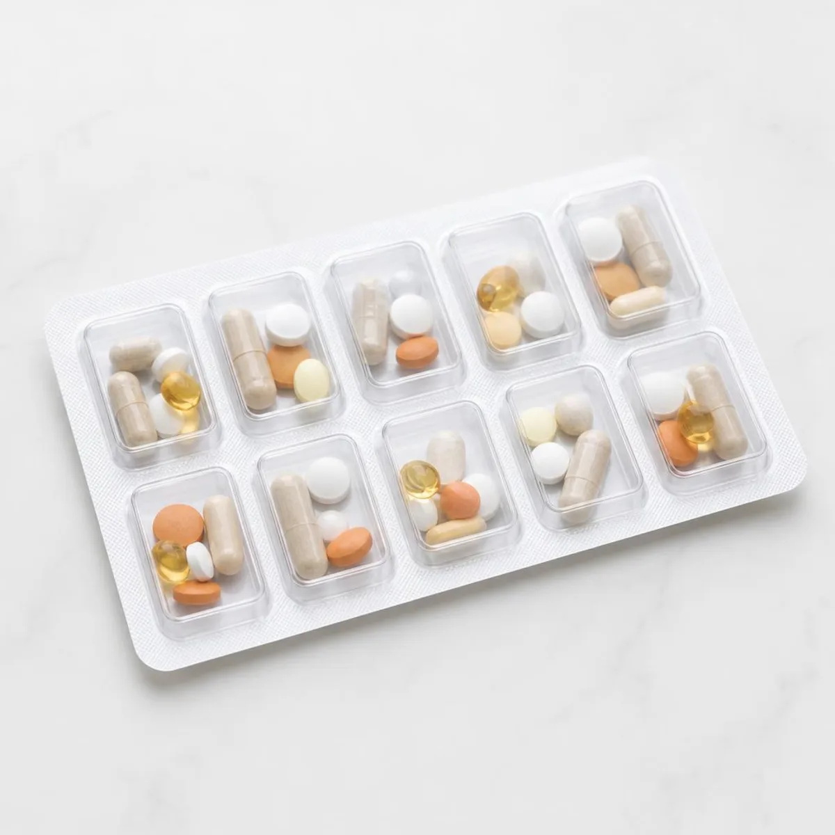 A multi-dose blister pack with pills organized by dose
